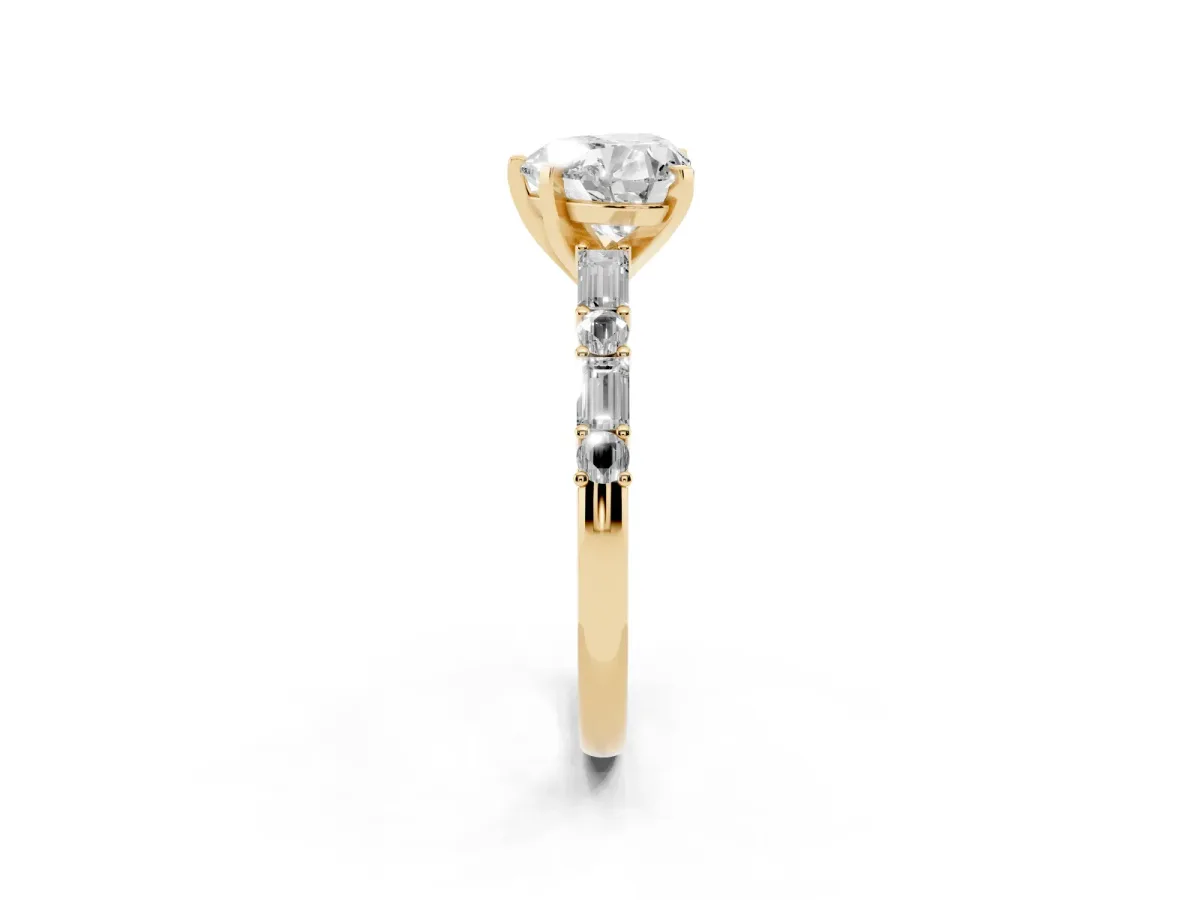 Heart Cut Diamond Solitaire with Side Baguettes and Channel Set Band Yellow gold