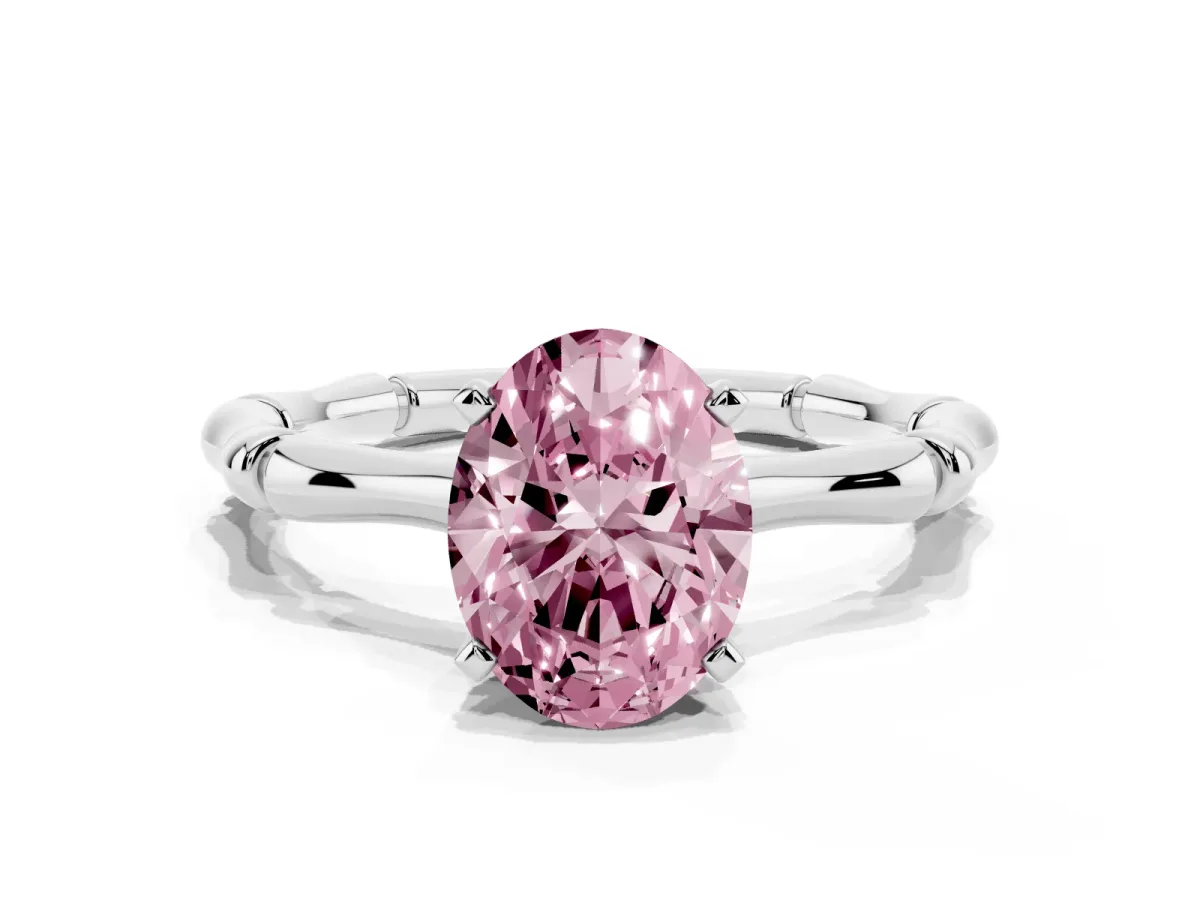 Fancy Pink Oval Cut Solitaire Diamond Ring with Bamboo Band and Four-Prong Setting Silver