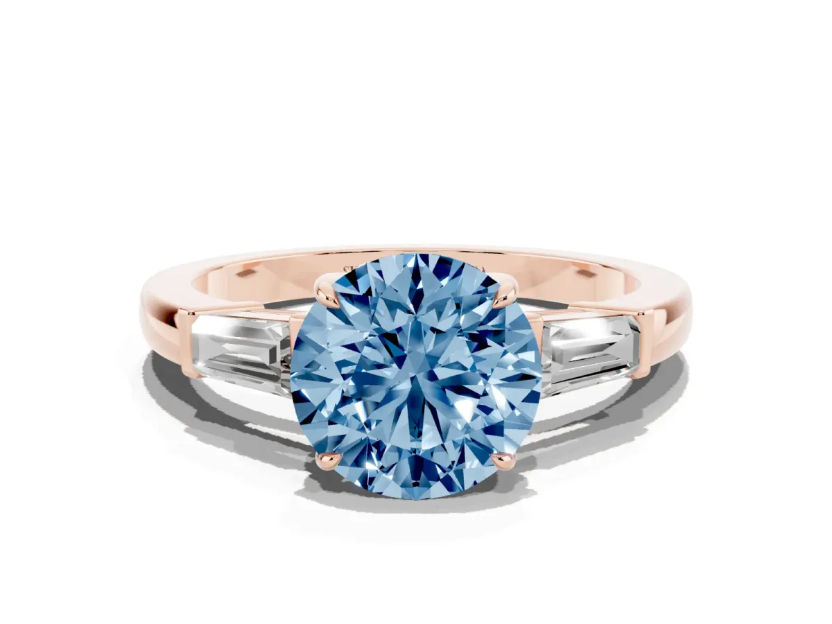 Fancy Blue Round Cut Diamond Three-Stone Ring with Tapered Baguette Side Stones and Prong Setting Rose gold