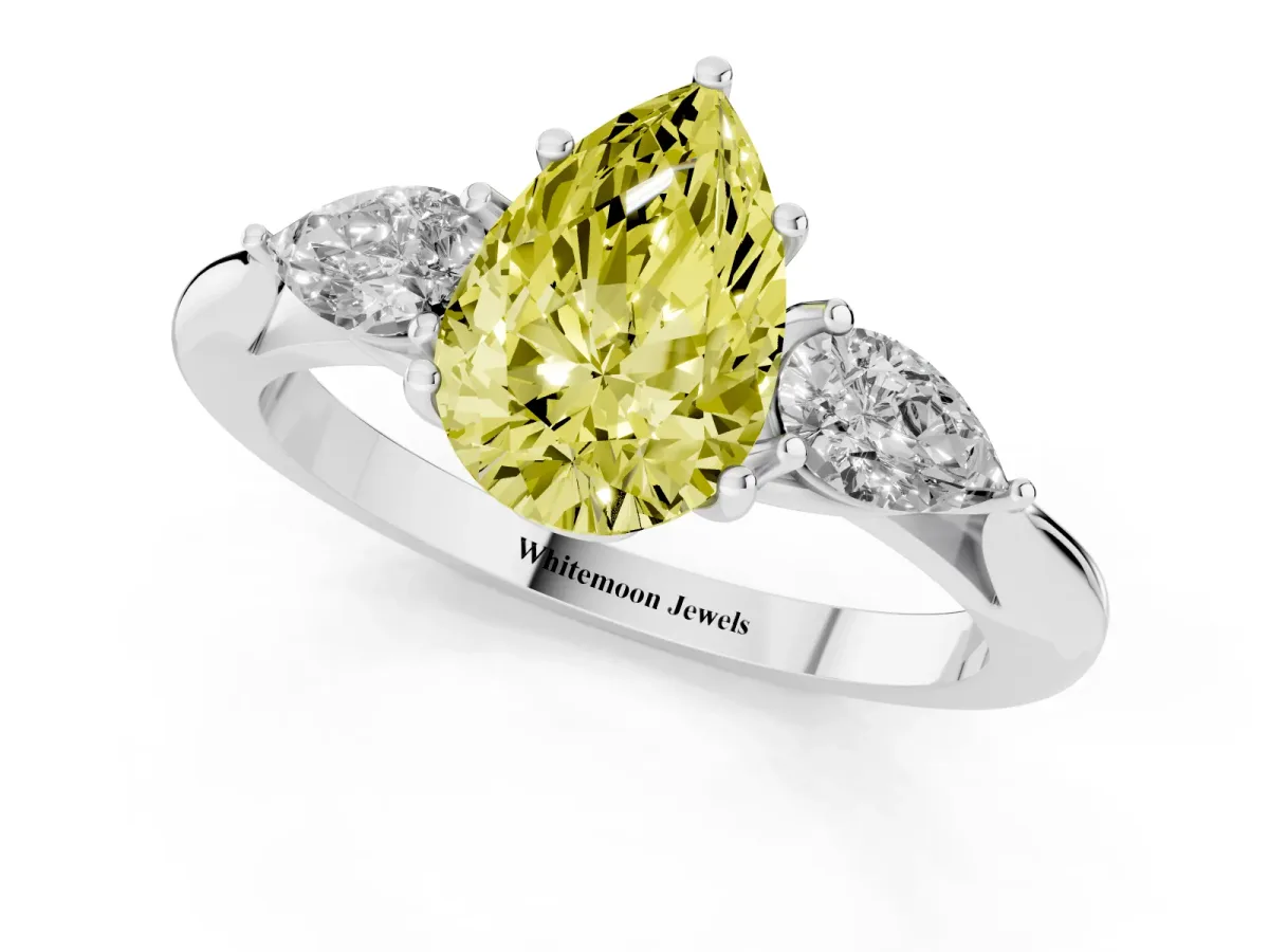 Fancy Yellow Pear Cut Diamond Three-Stone Ring with Pear Side Stones and Prong Setting Silver