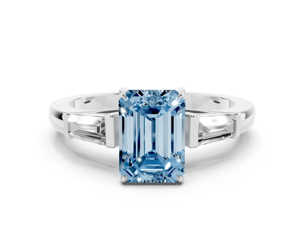 Fancy Blue Emerald Cut Diamond Three-Stone Ring with Tapered Baguette Side Stones and Prong Setting Platinum