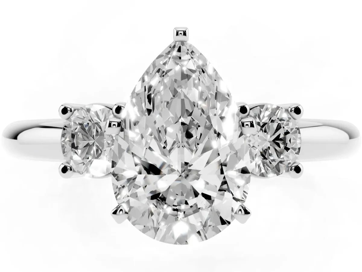 Three-Stone Pear Cut Cut Diamond Solitaire with Prong Setting and Classic Band Platinum