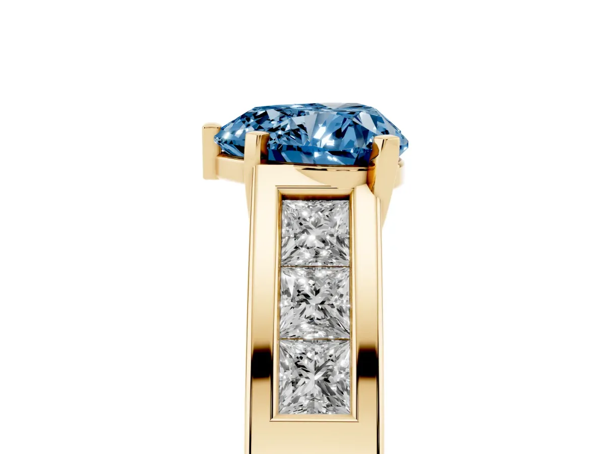 Fancy Blue Heart Cut Cut Channel Set Solitaire Ring with Four-Prong Setting Yellow gold