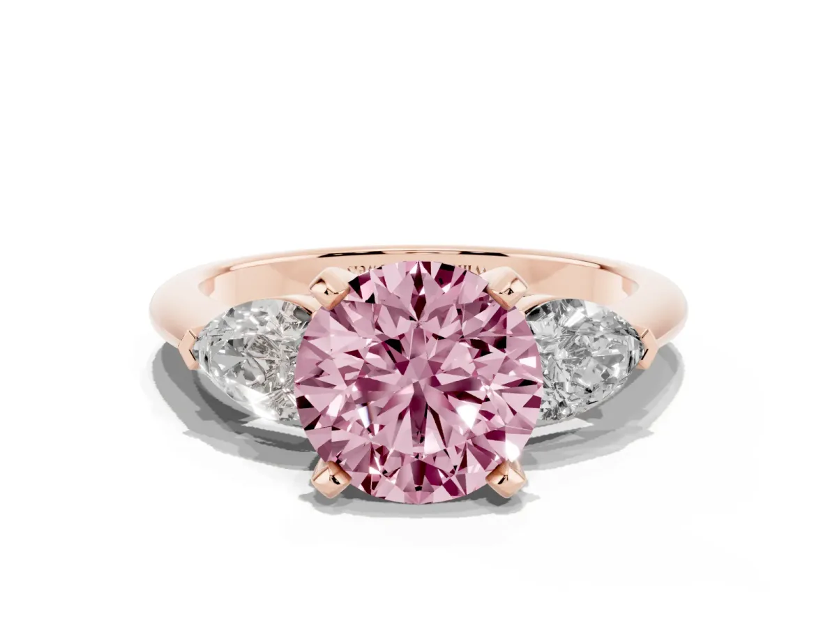 Fancy Pink Three-Stone Round Cut Diamond Ring with Pear Side Stones and Four-Prong Setting Rose gold