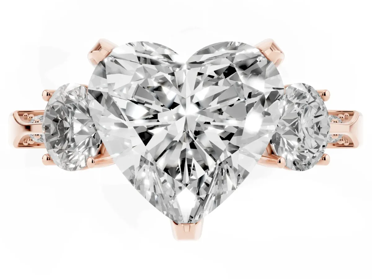 Heart Cut Brilliant Three-Stone Diamond Ring with Pavé Band and Four-Prong Setting Rose gold