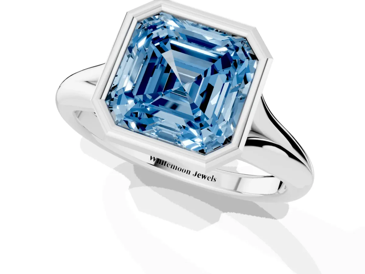 Fancy Blue Bezel Set Asscher Cut Solitaire Diamond Ring with Smooth Band White gold