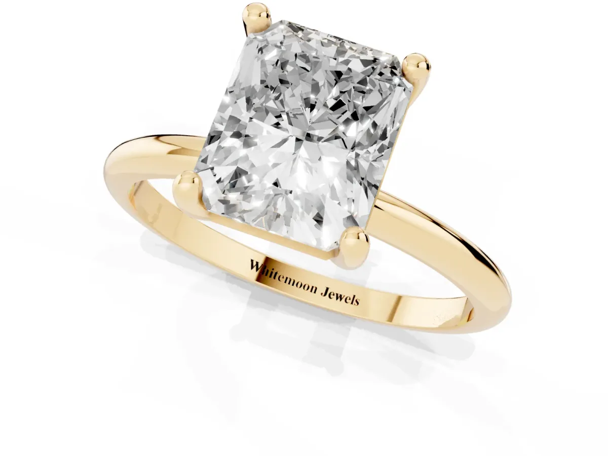 Radiant Cut Solitaire Diamond Ring with 4-Prong Setting on a Classic Band Yellow gold