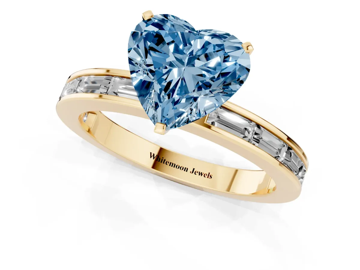 Fancy Blue Heart Cut Solitaire Diamond Ring with Channel-Set Baguette Band and Four-Prong Setting Yellow gold