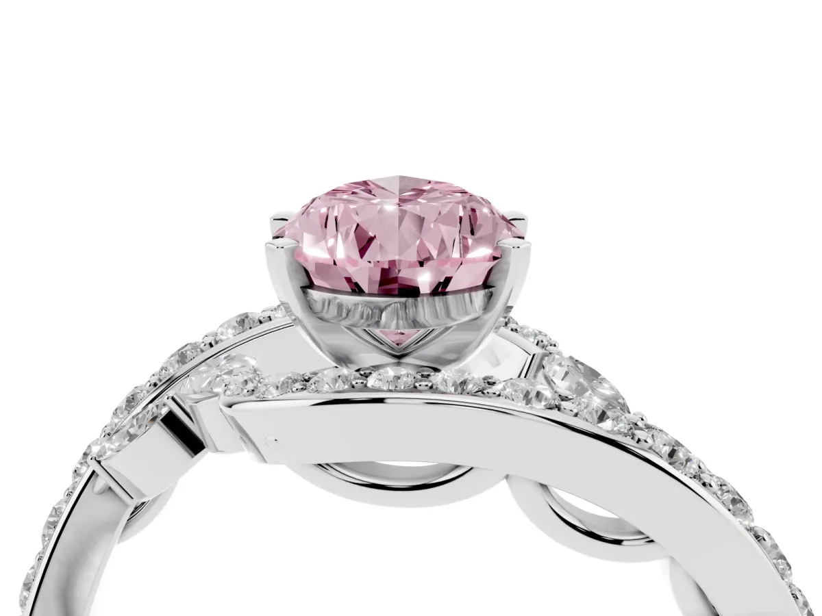 Fancy Pink Pear Cut Solitaire with Pavé Twist Band and Four-Prong Setting Silver