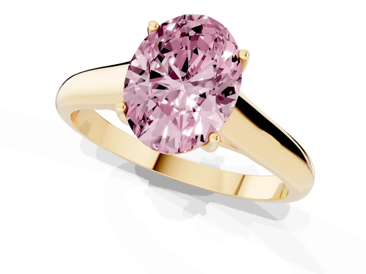 Fancy Pink Oval Cut Solitaire Engagement Ring with Tapered Band and Four-Prong Setting Yellow gold