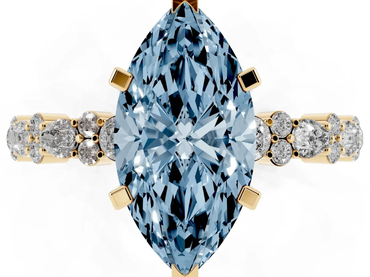 Fancy Blue Marquise Cut Diamond Side Stone Solitaire Ring with Round and Four-Prong Setting Yellow gold