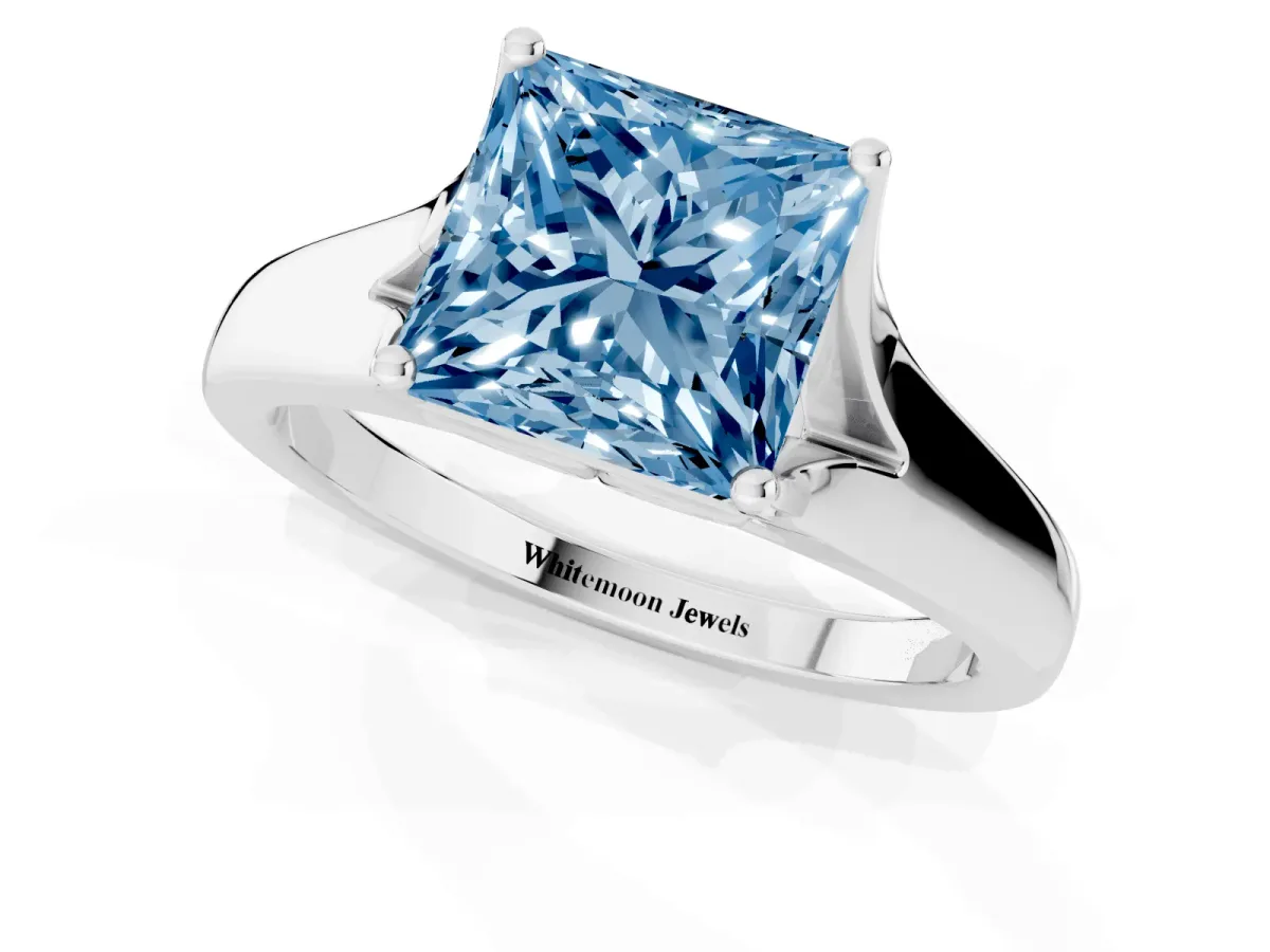 Fancy Blue Princess Cut Solitaire Diamond Ring with Cathedral Band and Four-Prong Setting Silver