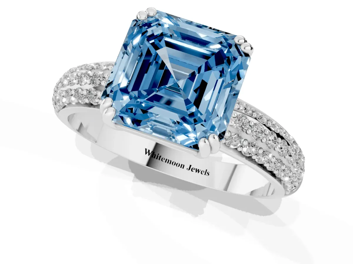 Fancy Blue Asscher Cut Diamond Solitaire Ring with Multi-Row Round Pavé Band and Prong Setting Silver
