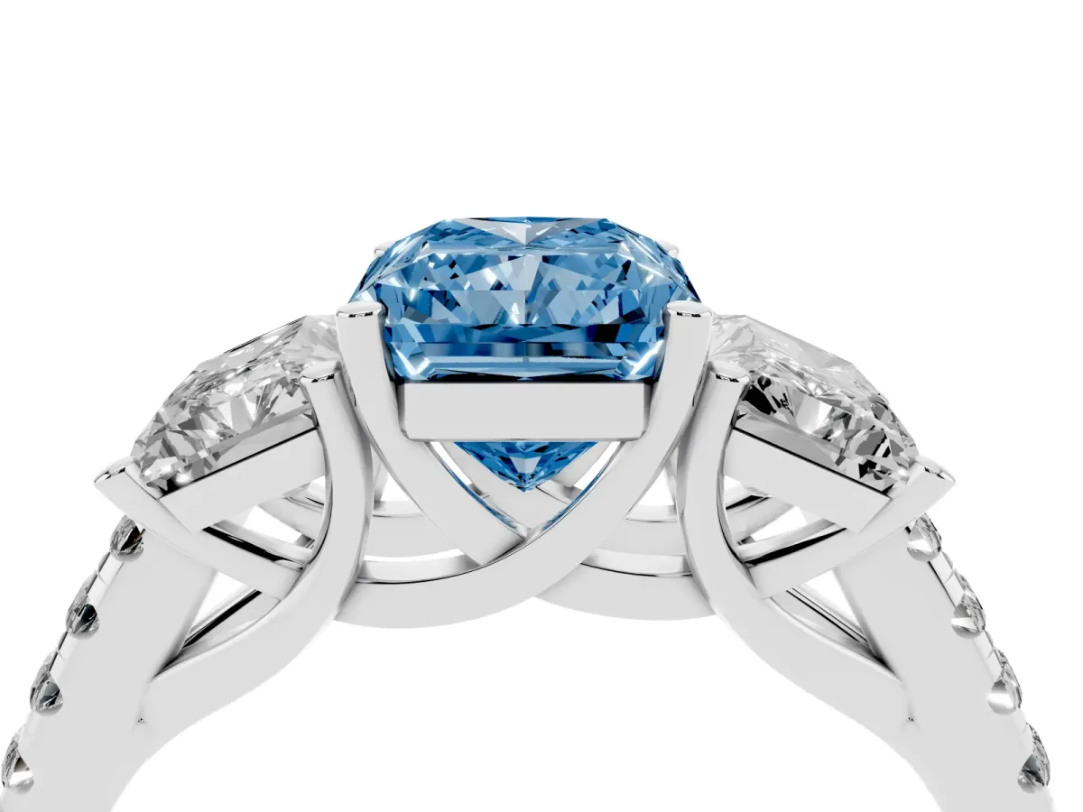 Fancy Blue Three-Stone Radiant Cut Diamond Ring with Round Pavé Band and Prong Setting Silver