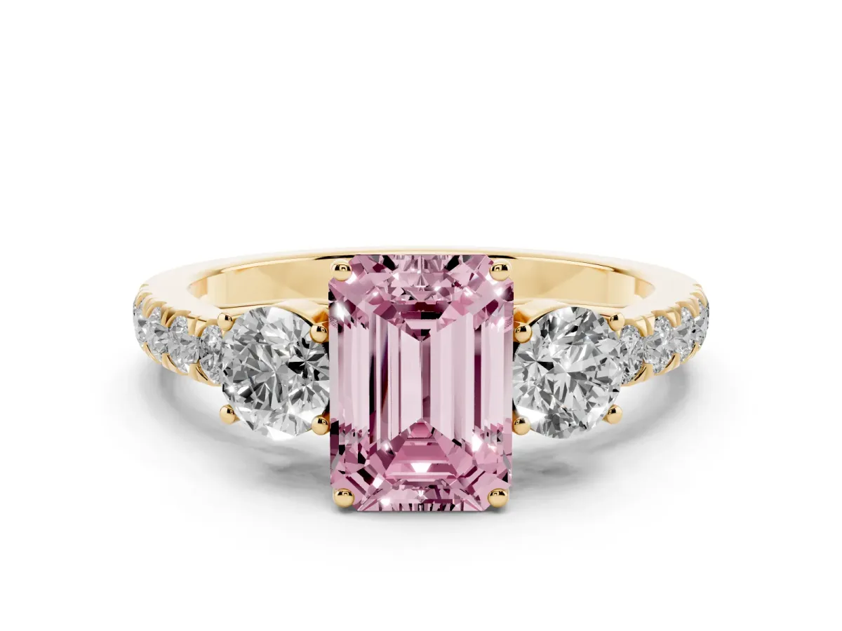 Fancy Pink Emerald Cut Cut Diamond Three-Stone Ring with Round Side Stones and Pavé Band Yellow gold