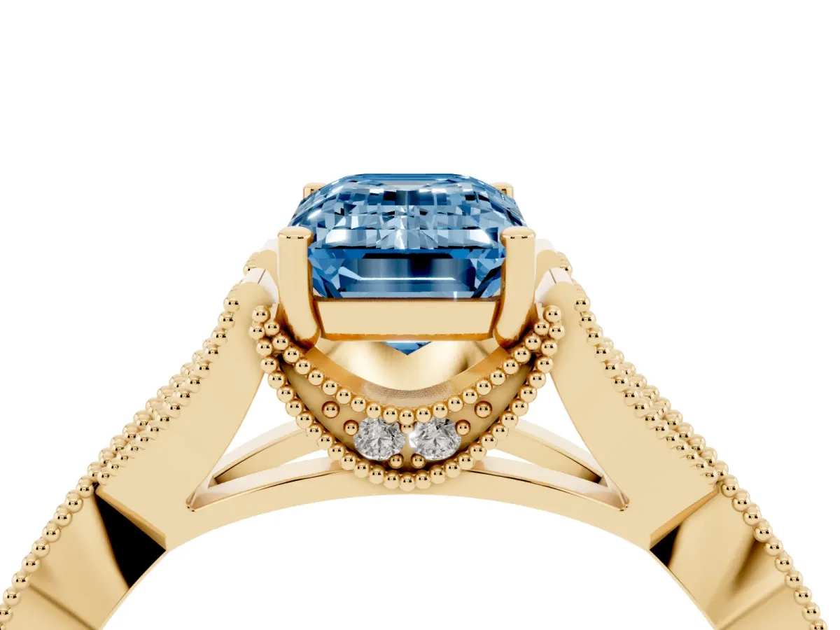 Fancy Blue Emerald Cut Cut Diamond Twisted Band with Milgrain Pave Setting and Four-Prong Setting Yellow gold