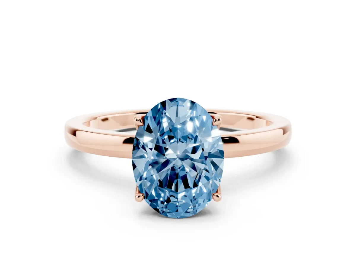 Fancy Blue Oval Cut Diamond Solitaire Ring with Thin Band and Prong Setting Rose gold