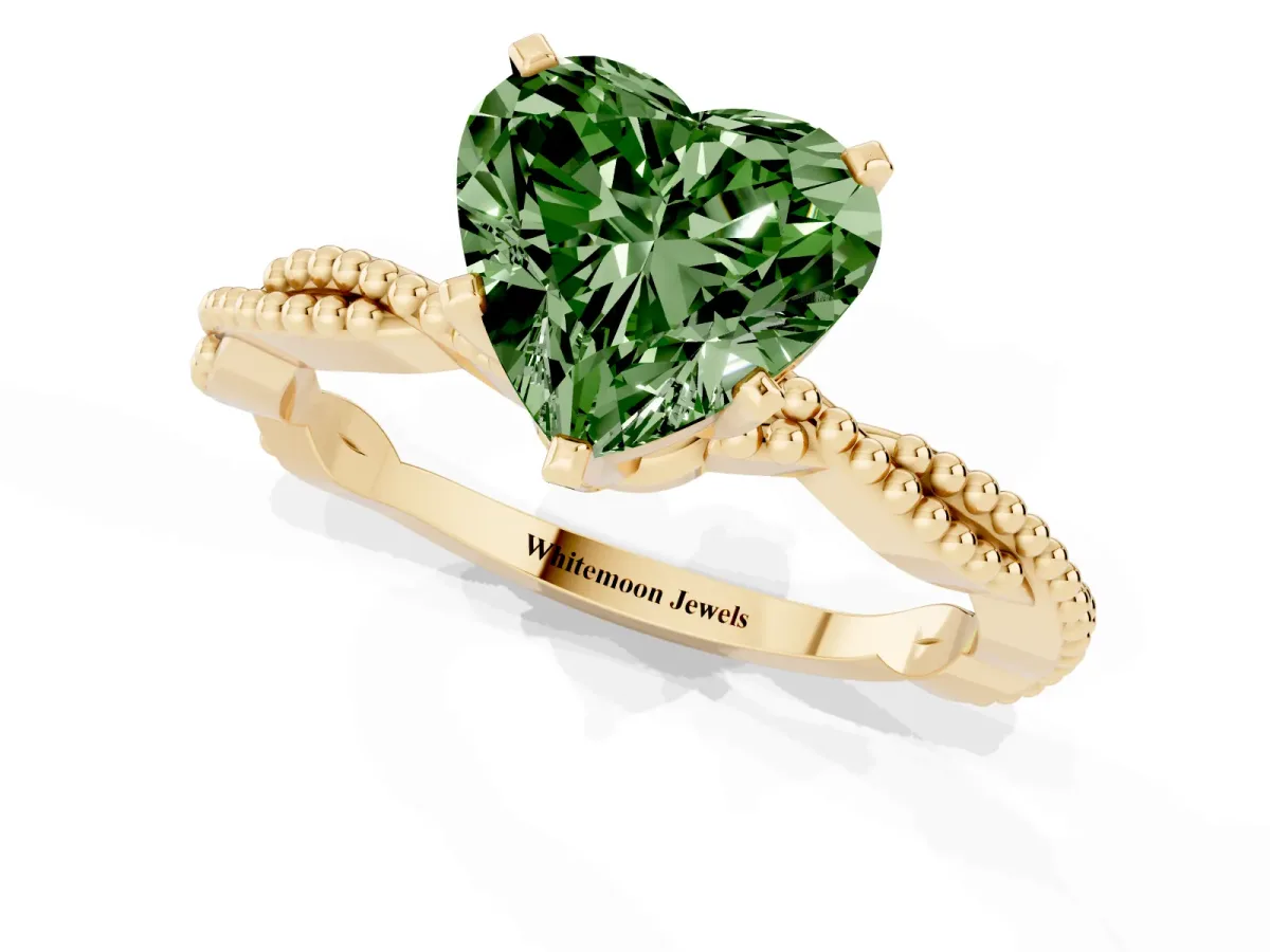 Fancy Green Heart Cut Solitaire Twisted Band with Bead Prong Setting Yellow gold