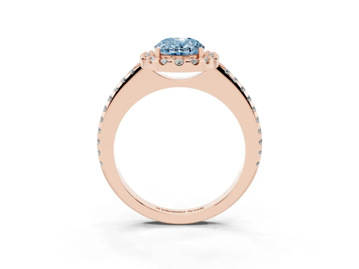 Fancy Blue Oval Cut Diamond Pavé Halo Ring with Four-Prong Setting Rose gold