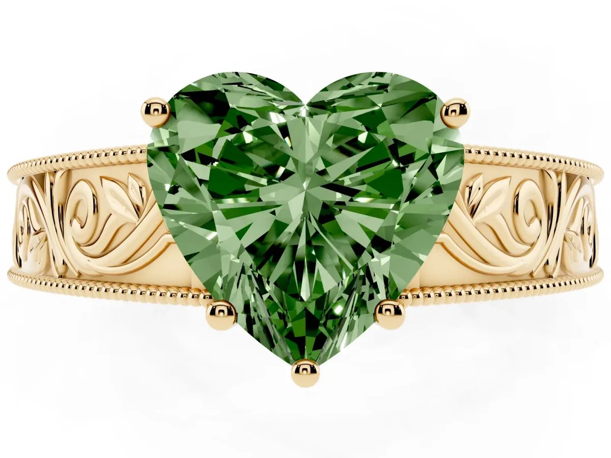 Fancy Green Heart Cut Diamond Solitaire Ring with Engraved Band and Four-Prong Setting Yellow gold
