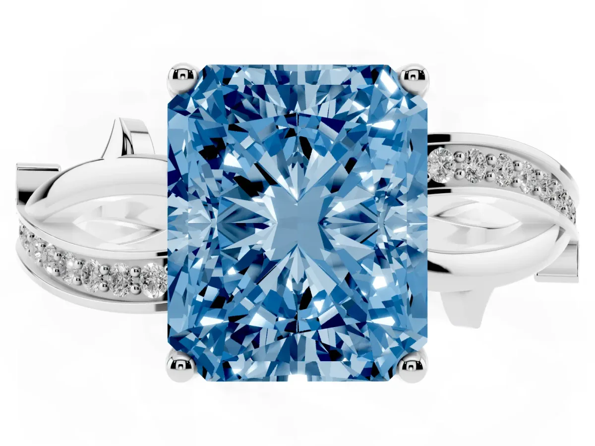Fancy Blue Radiant Cut Solitaire Twist Band with Pavé Accents and Four-Prong Setting Silver