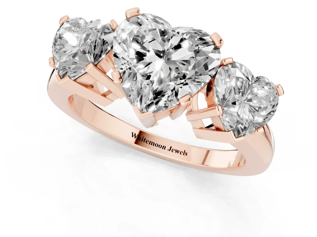Three-Stone Heart Cut Cut Diamond Ring with Channel Set Band and Four-Prong Setting Rose gold