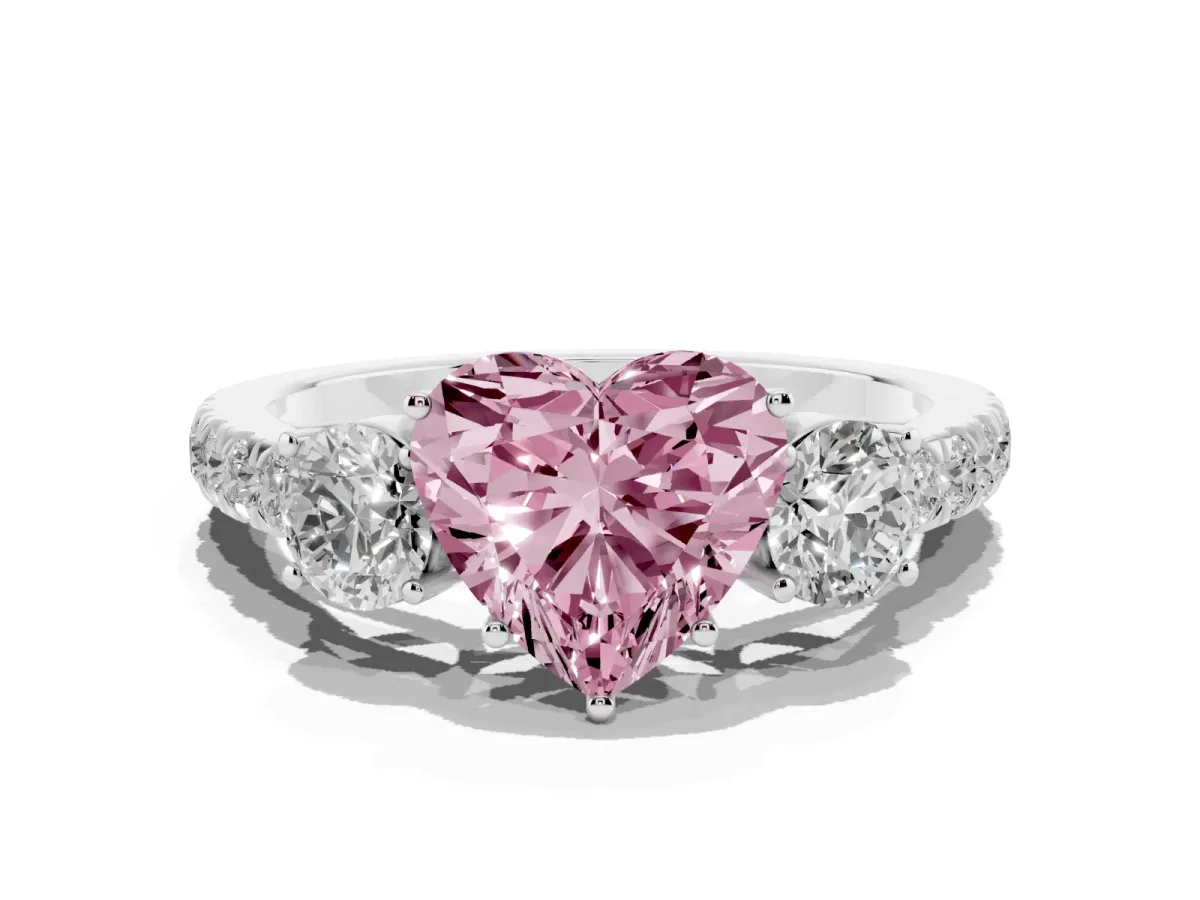 Fancy Pink Heart Cut Cut Diamond Three-Stone Ring with Round Side Stones and Pavé Band Silver