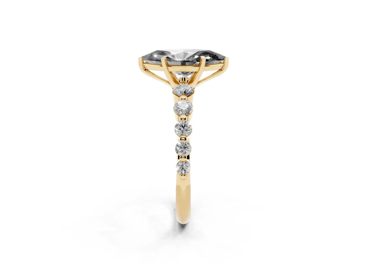 Fancy Black Marquise Cut Solitaire Diamond Ring with Pave Band and Four-Prong Setting Yellow gold
