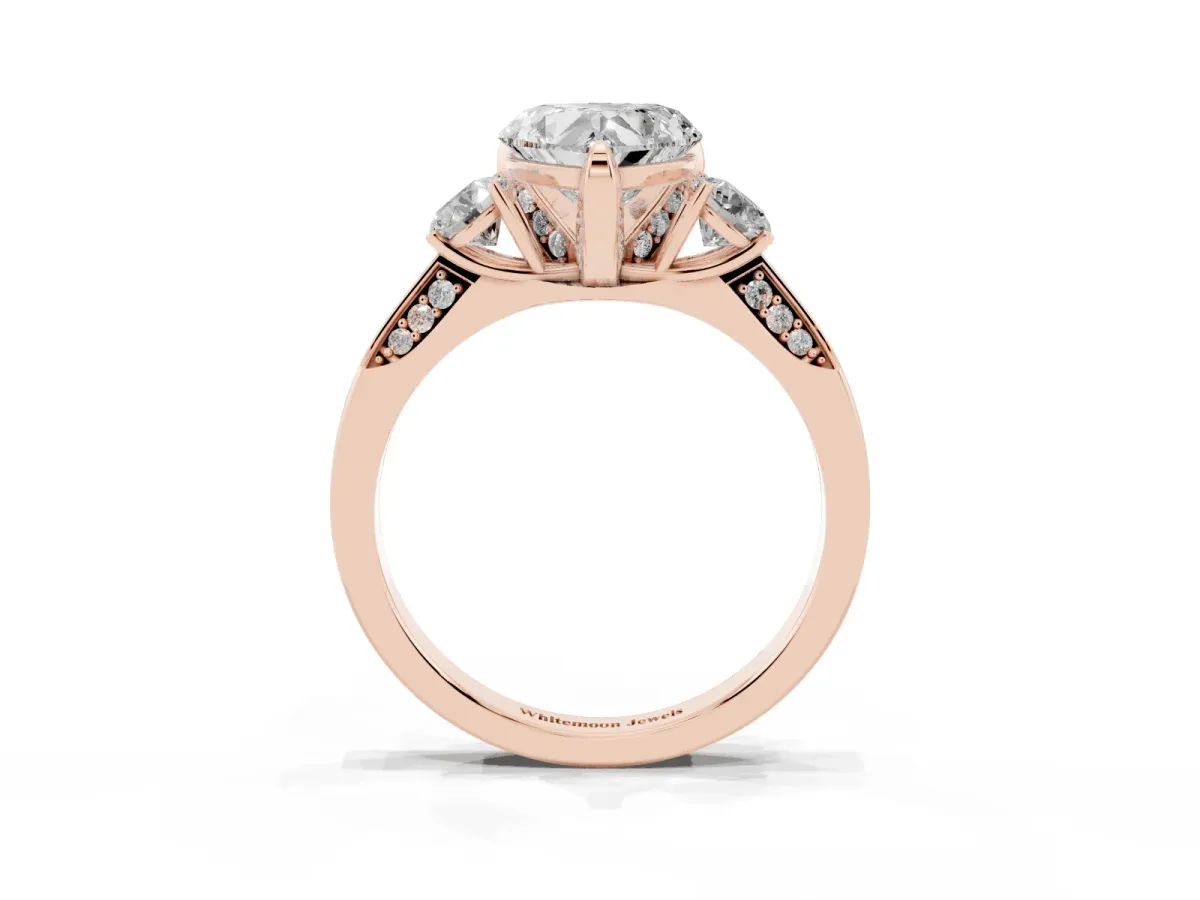 Heart Cut Brilliant Three-Stone Diamond Ring with Pavé Band and Four-Prong Setting Rose gold