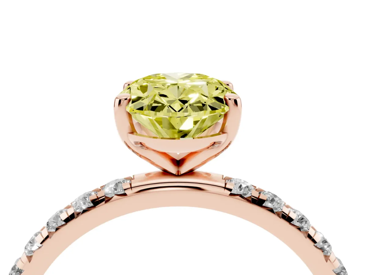 Fancy Yellow Oval Cut Cut Diamond Solitaire Ring with Micro Pave Band and Four Prong Setting Rose gold