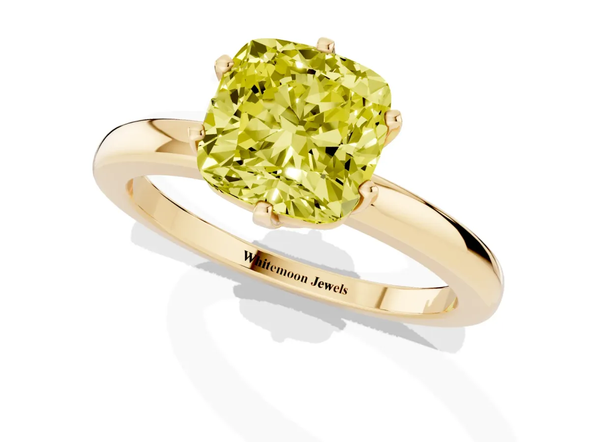 Fancy Yellow Cushion Cut Solitaire Diamond Ring with Six-Prong Setting on a Classic Band Yellow gold