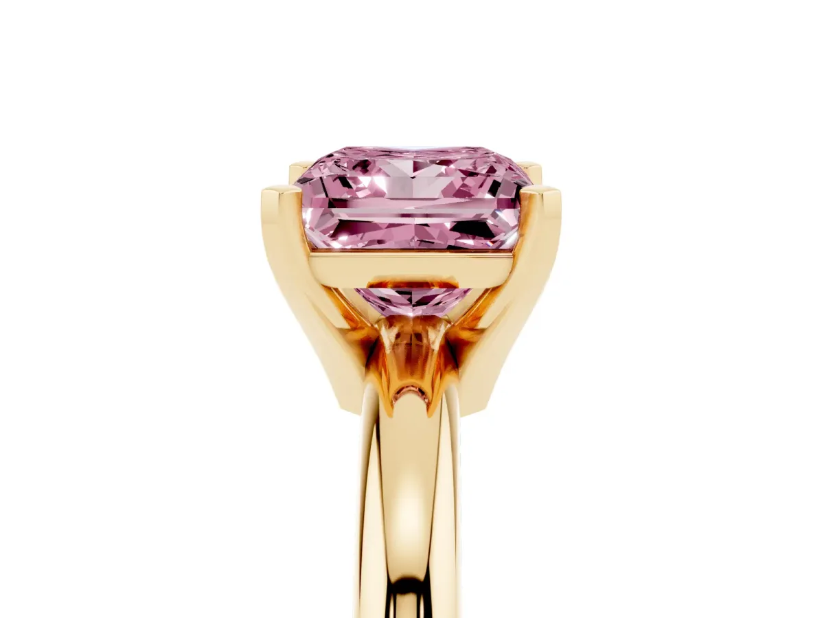 Fancy Pink Princess Cut Diamond Solitaire Engagement Ring with Round Band and Four-Prong Setting Yellow gold