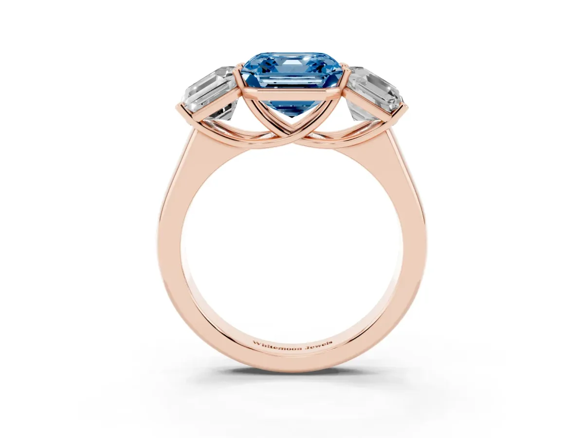 Fancy Blue Asscher Cut Three-Stone Diamond Ring with Prong Setting on a Classic Band Rose gold
