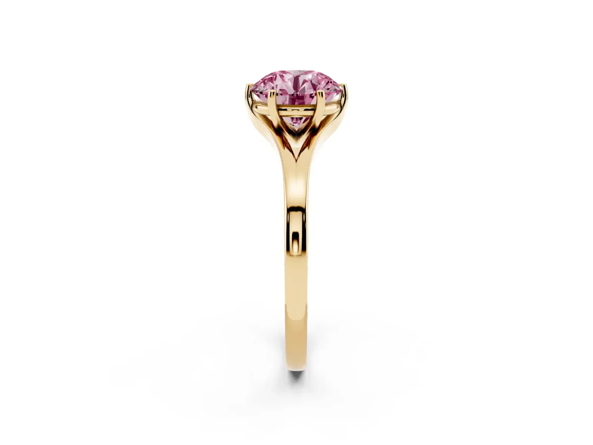 Fancy Pink Round Cut Solitaire Diamond Ring with Six-Prong Setting and Tapered Band Yellow gold