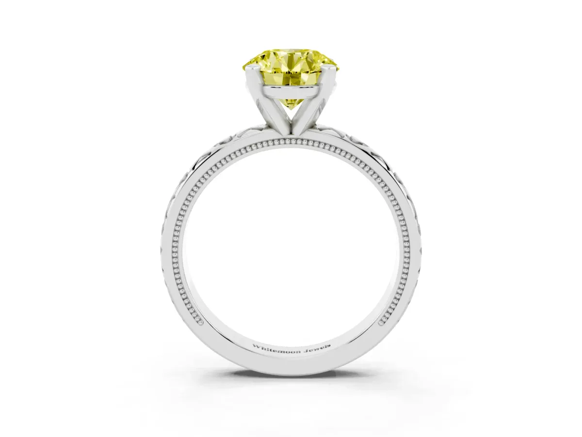 Fancy Yellow Round Cut Solitaire Diamond Engagement Ring with XO Engraved Band and Four-Prong Setting Silver