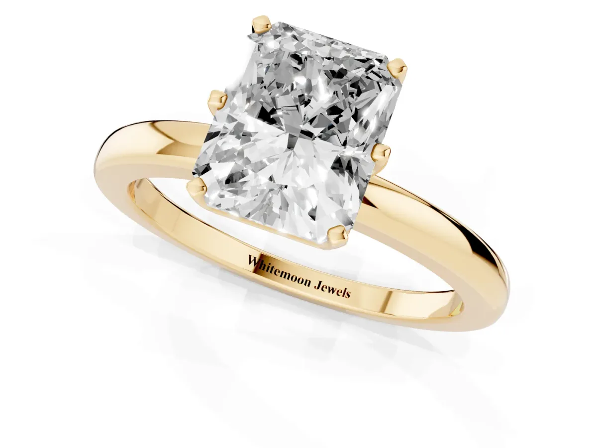 Radiant Cut Solitaire Diamond Ring with Six-Prong Setting on a Classic Band Yellow gold
