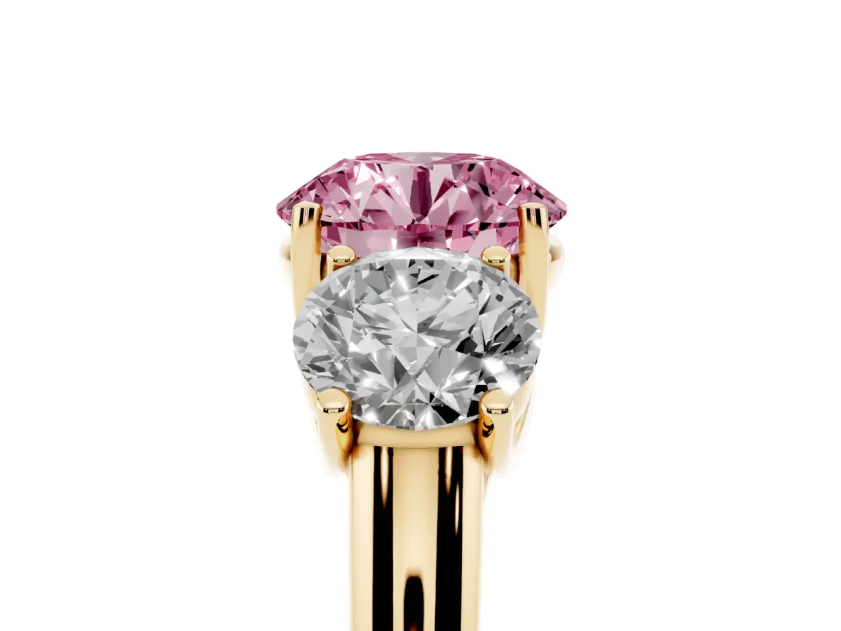 Fancy Pink Three-Stone Round Cut Diamond Engagement Ring with Prong Setting Yellow gold