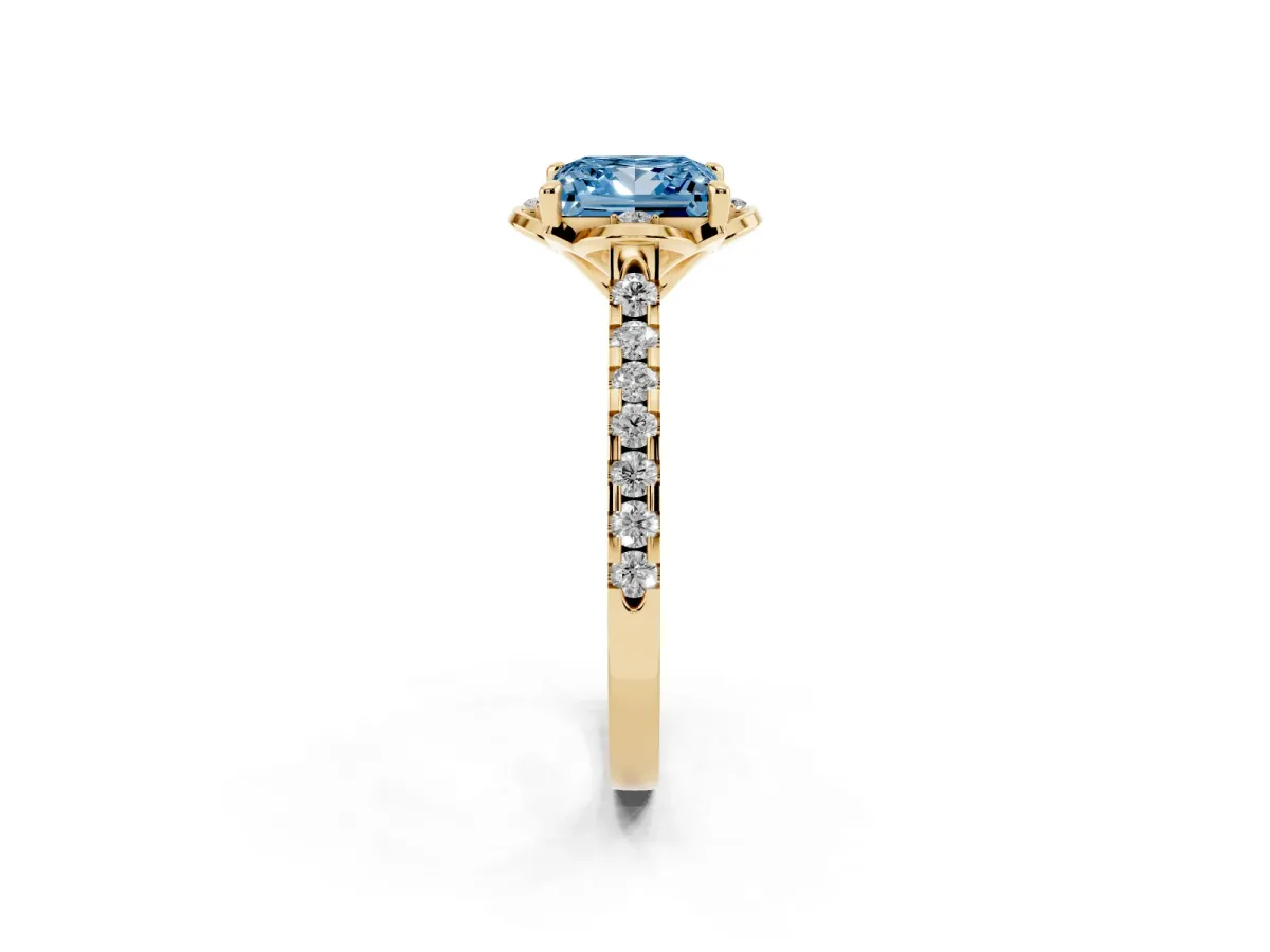 Fancy Blue Princess Cut Diamond Ring with Pavé Band and Floral Prong Setting Yellow gold