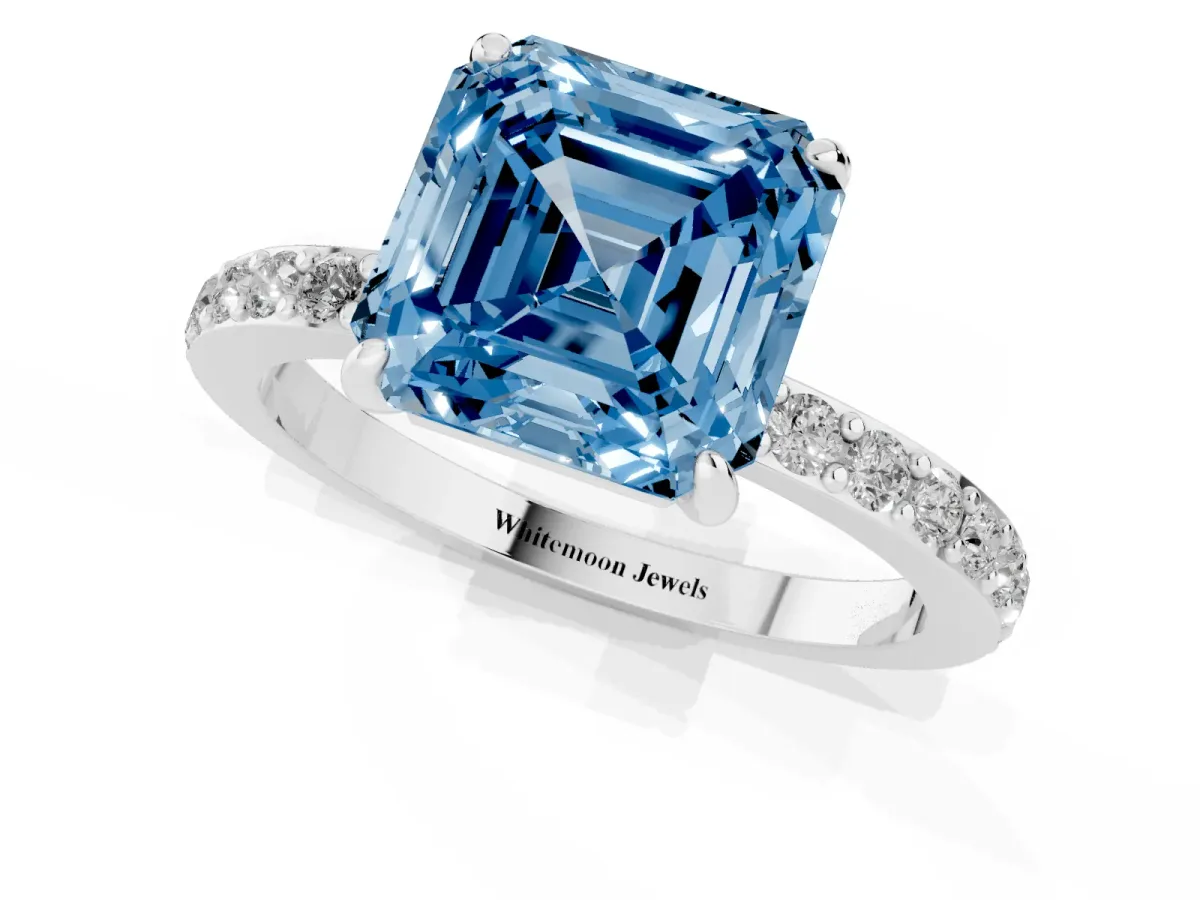 Fancy Blue Asscher Cut Diamond Pavé Engagement Ring with Round Accents and Prong Setting Silver