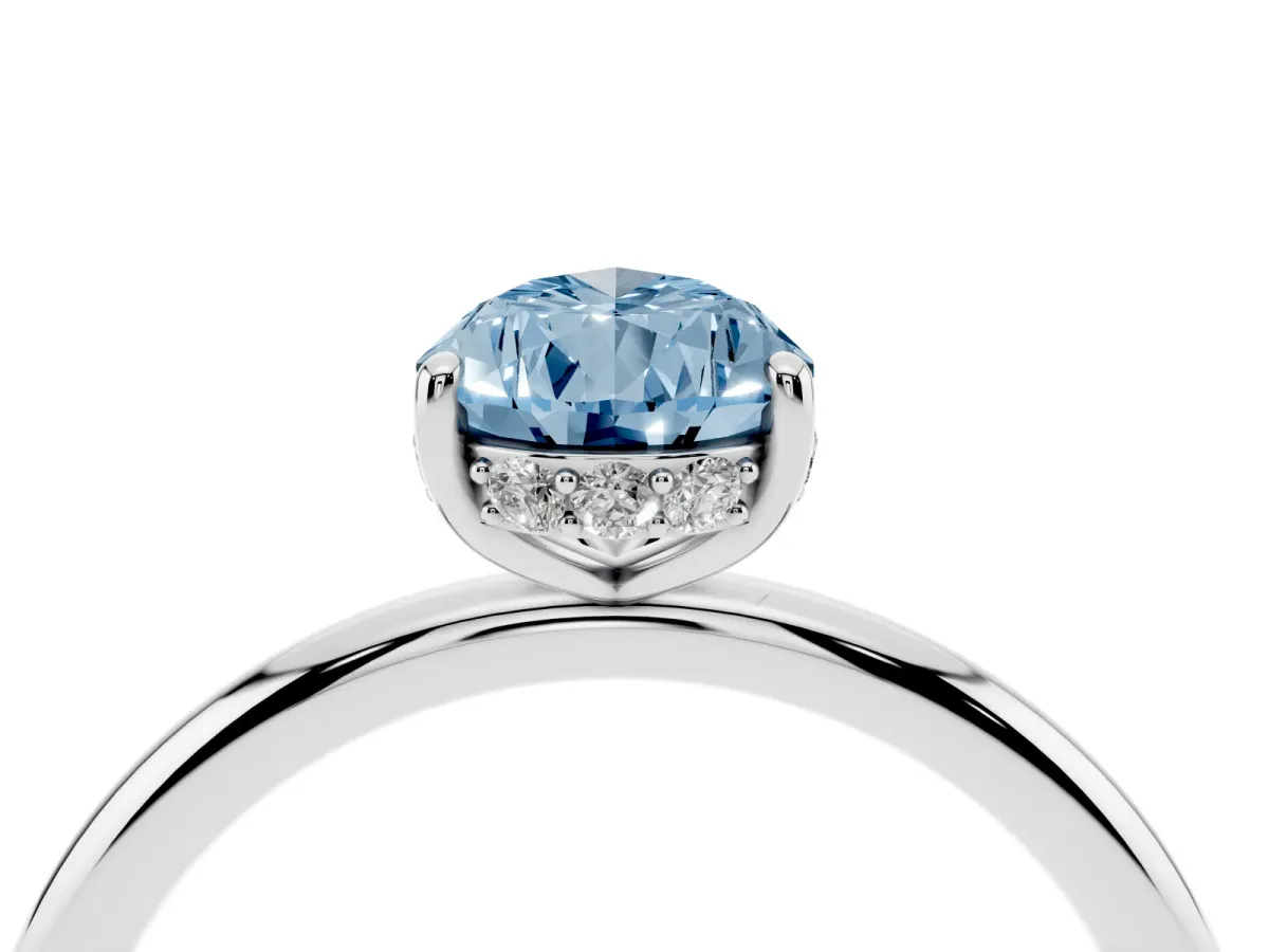 Fancy Blue Pear Cut Solitaire Diamond Ring with a Classic Band and Four-Prong Setting Platinum