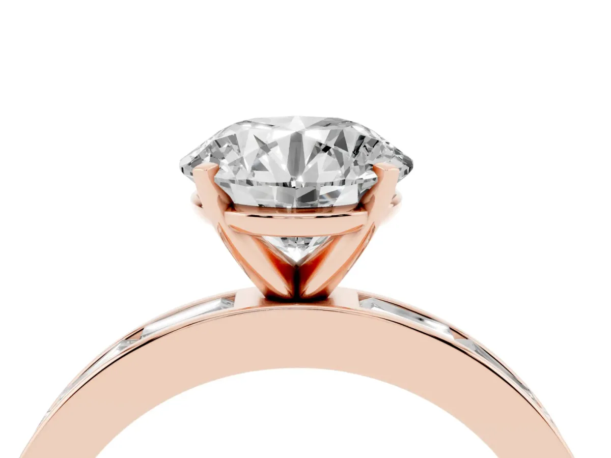 Round Cut Solitaire Diamond Ring with Channel-Set Baguette Band and Four-Prong Setting Rose gold