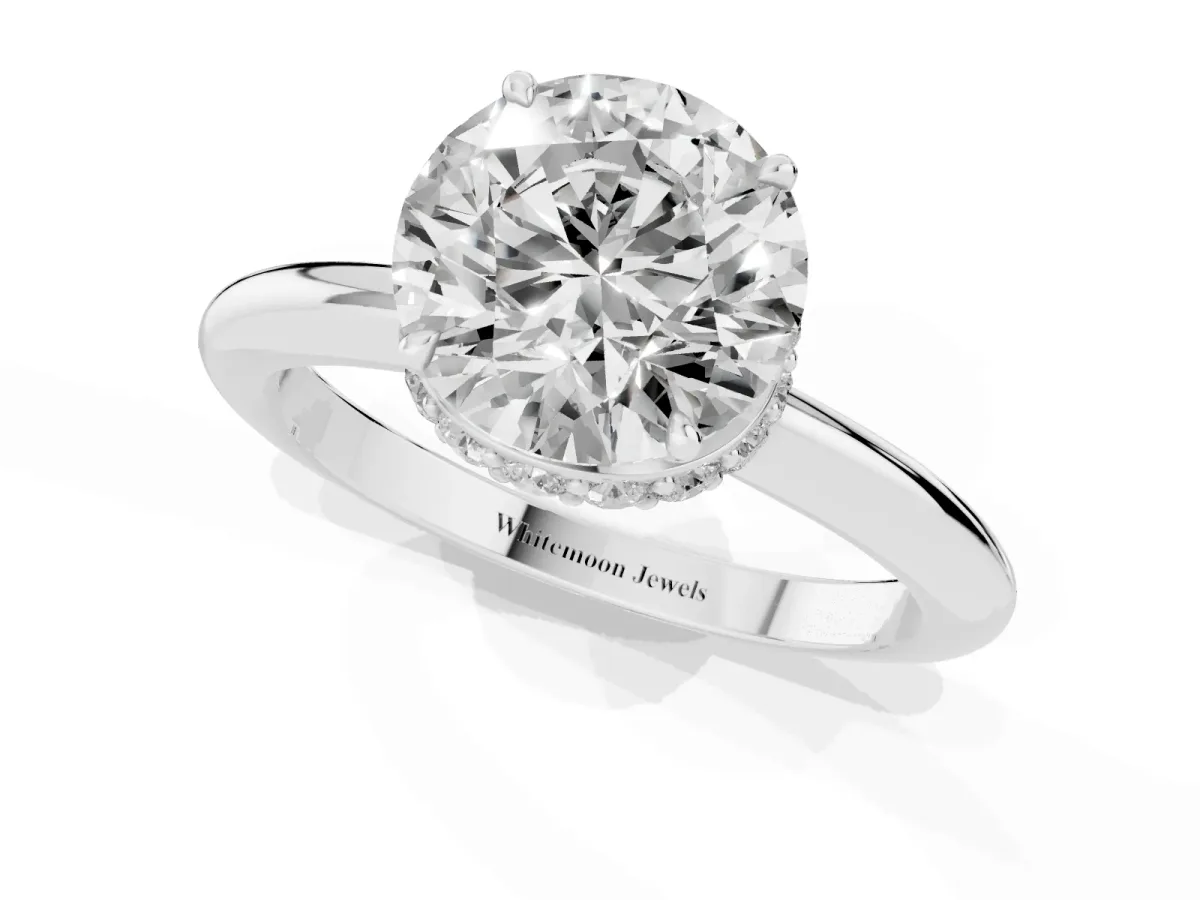 Round Cut Brilliant Solitaire Engagement Ring with Six-Prong Setting and Classic Band White gold