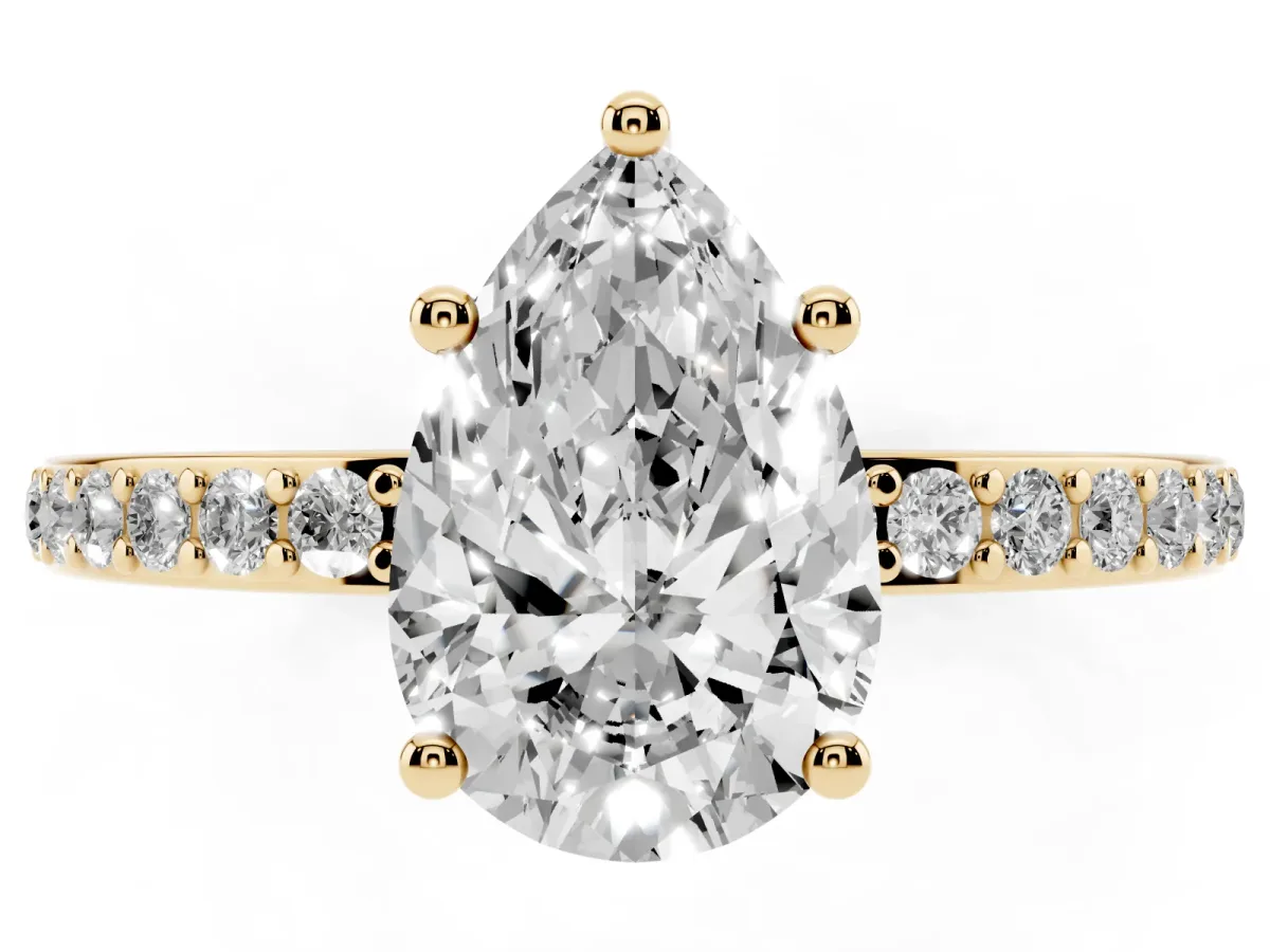Pear Cut Cut Diamond Pavé Band Ring with Four-Prong Setting Yellow gold