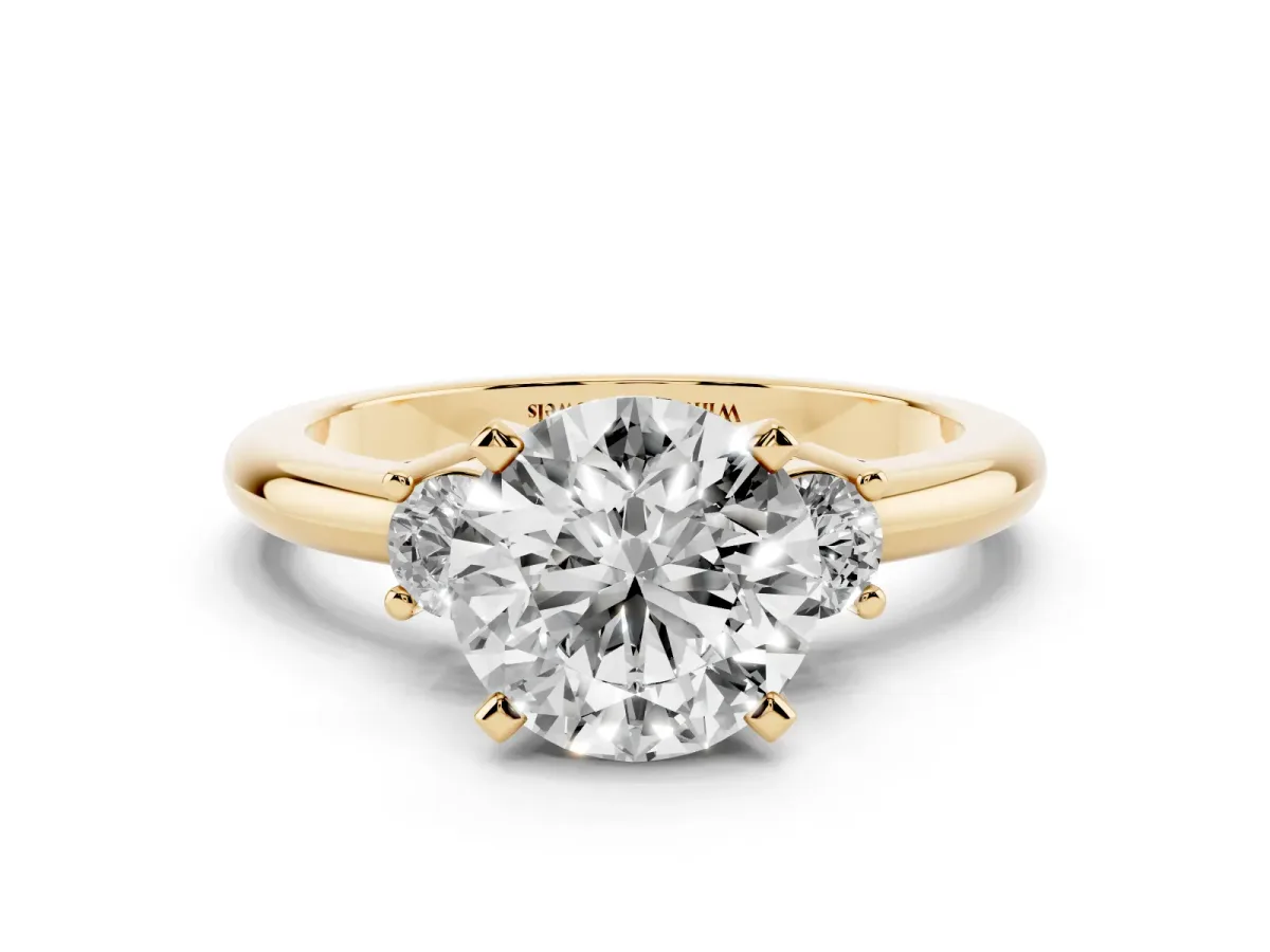 Three-Stone Round Cut Cut Diamond Solitaire with Prong Setting and Classic Band Yellow gold
