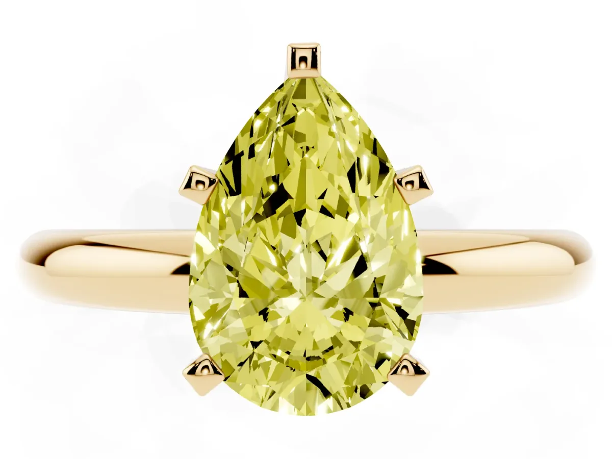 Fancy Yellow Pear Cut Diamond Solitaire Engagement Ring with Round Band and Four-Prong Setting Yellow gold