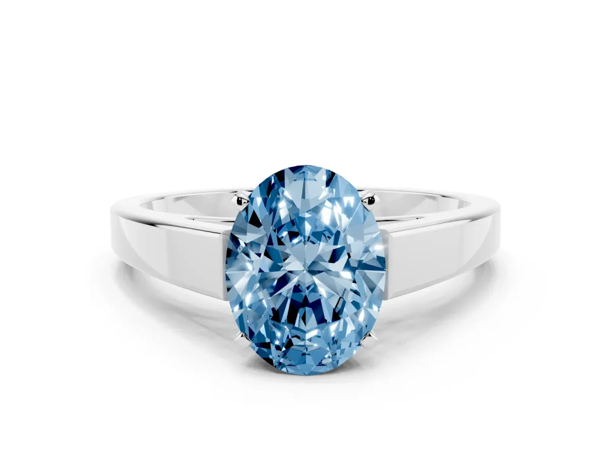 Fancy Blue Oval Cut Solitaire Engagement Ring with Four-Prong Setting and Tapered Band Silver