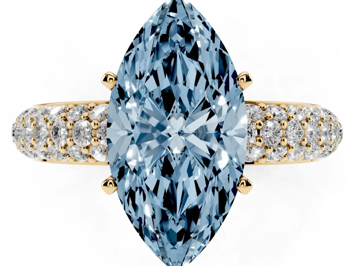 Fancy Blue Marquise Cut Diamond Solitaire Ring with Prong Setting and Pavé Band Yellow gold