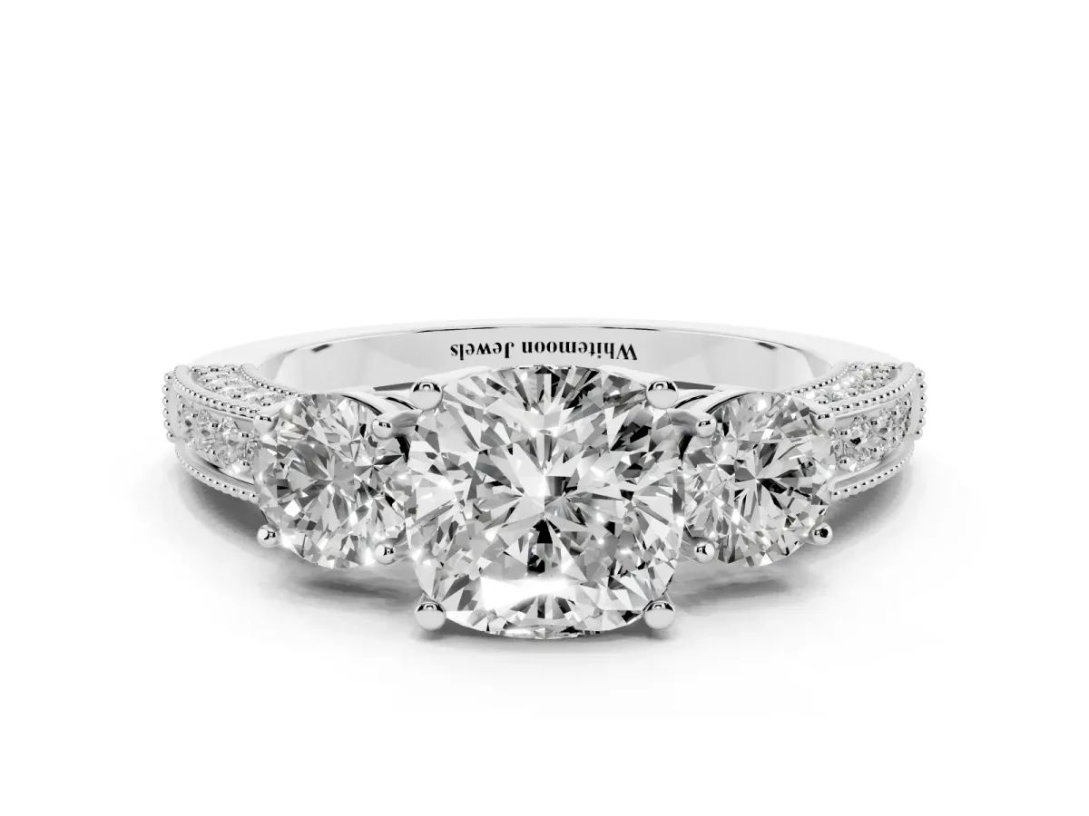 Cushion Cut Three-Stone Diamond Ring with Pavé Band and Four-Prong Setting Silver