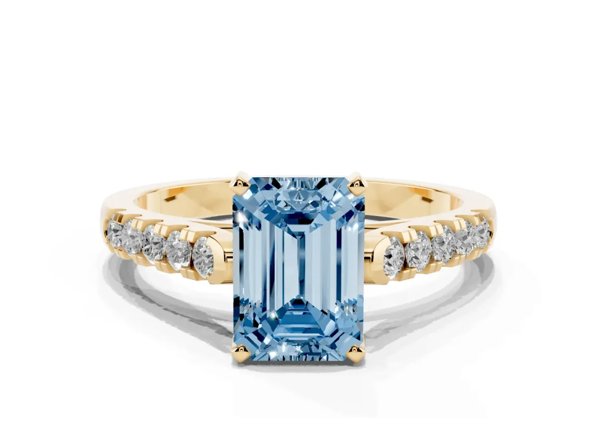 Fancy Blue Emerald Cut Diamond Pavé Band Solitaire Ring with Prong Setting Yellow gold
