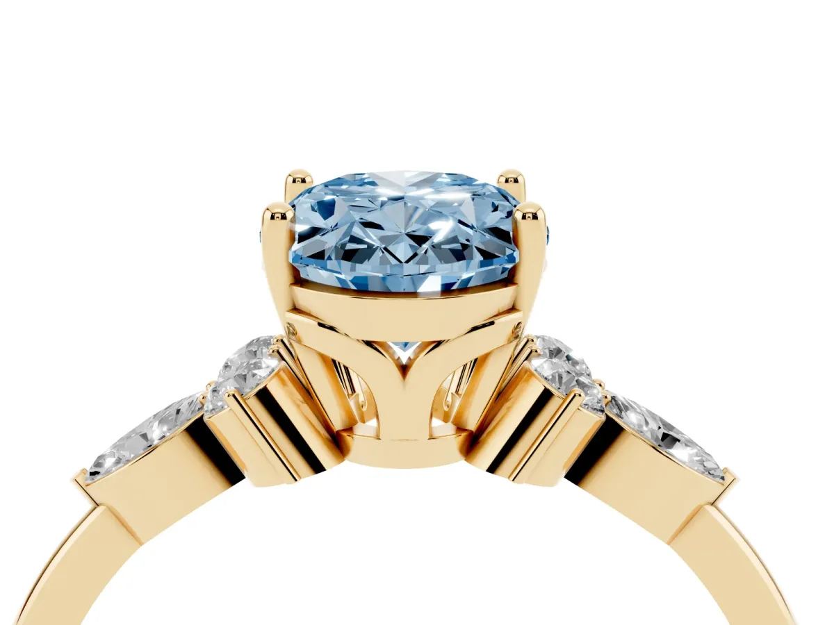 Fancy Blue Oval Cut Brilliant Diamond Solitaire Ring with Pear Side Stones and Four-Prong Setting Yellow gold